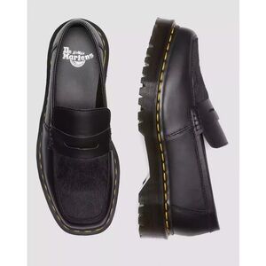 Women’s Authentic Dr. Martens Black Penny Loafers with textured hair on details